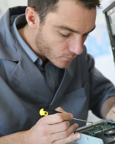 Technician fixing computer hardware-2-1